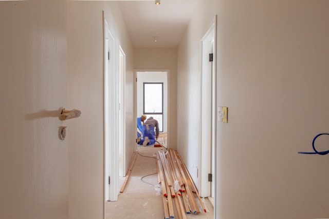 A couple of men working in a house